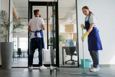 Cleaning services being performed in an office